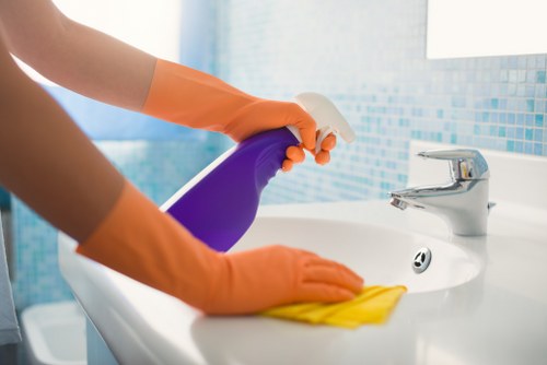 Enfield cleaners using protective equipment during a cleaning task