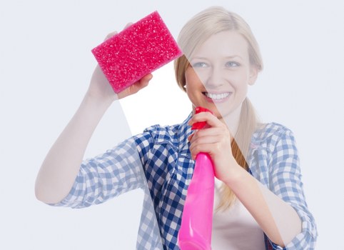 Trained Enfield Cleaners staff using safe cleaning practices