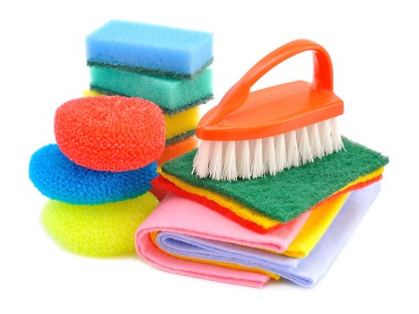 Cleaners storing labelled products safely in a secure area